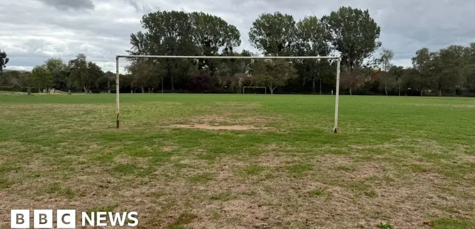 Empty soccer goal on a grassy field