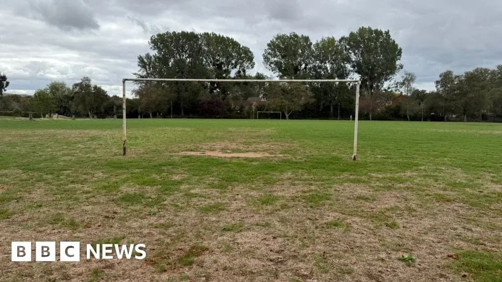 Empty soccer goal on a grassy field