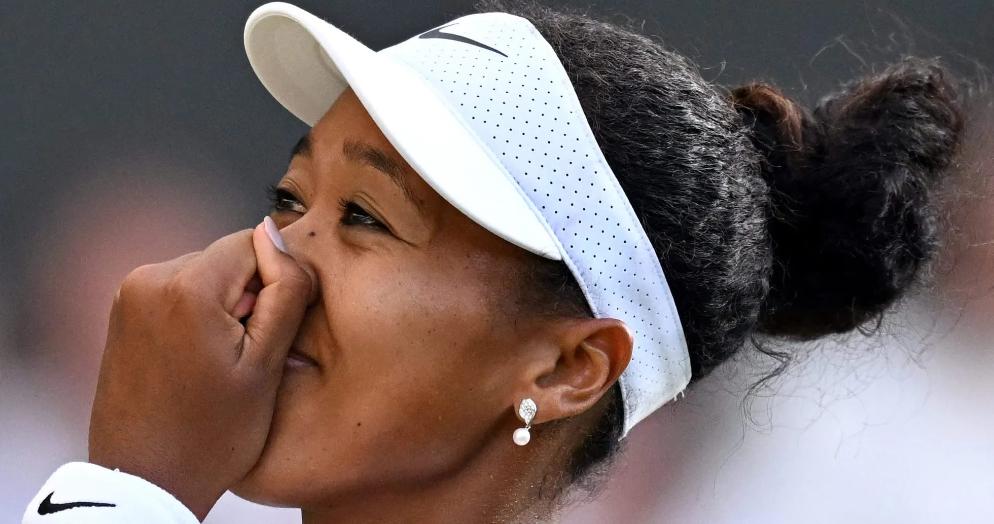 Naomi Osaka celebrating after a match point