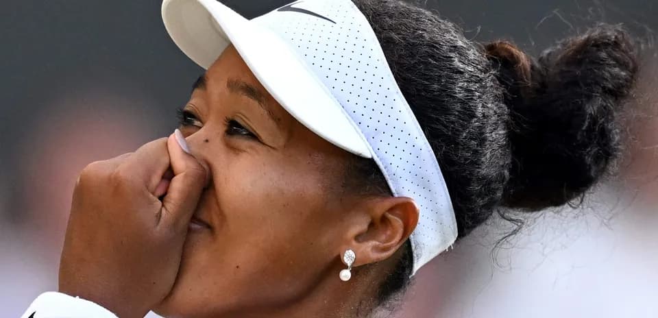 Naomi Osaka celebrating after a match point
