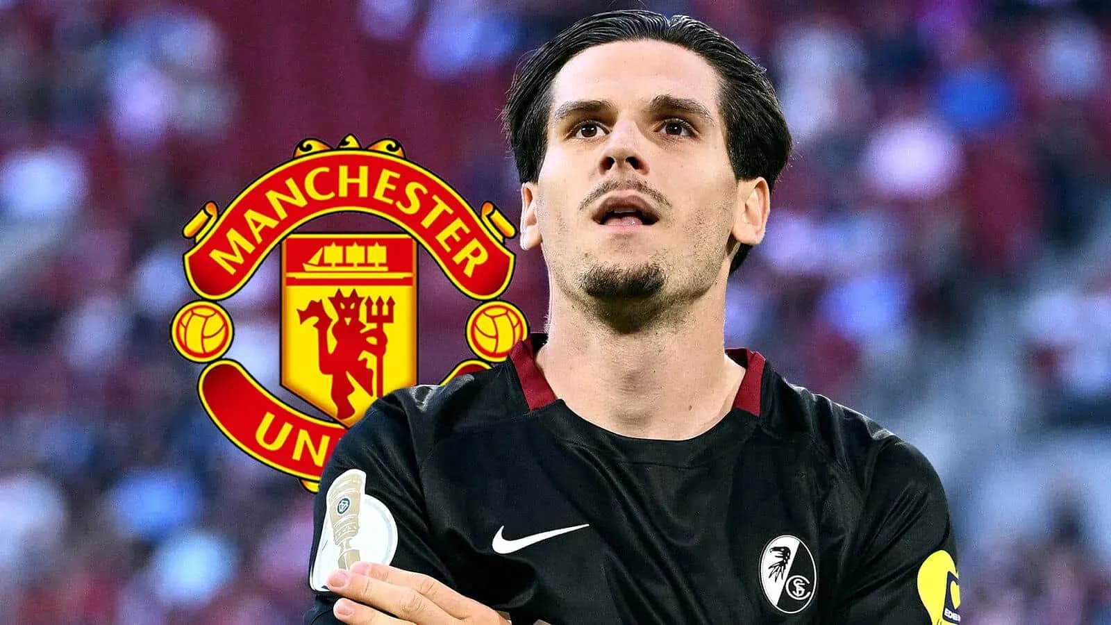 Player in black jersey with Manchester United logo background