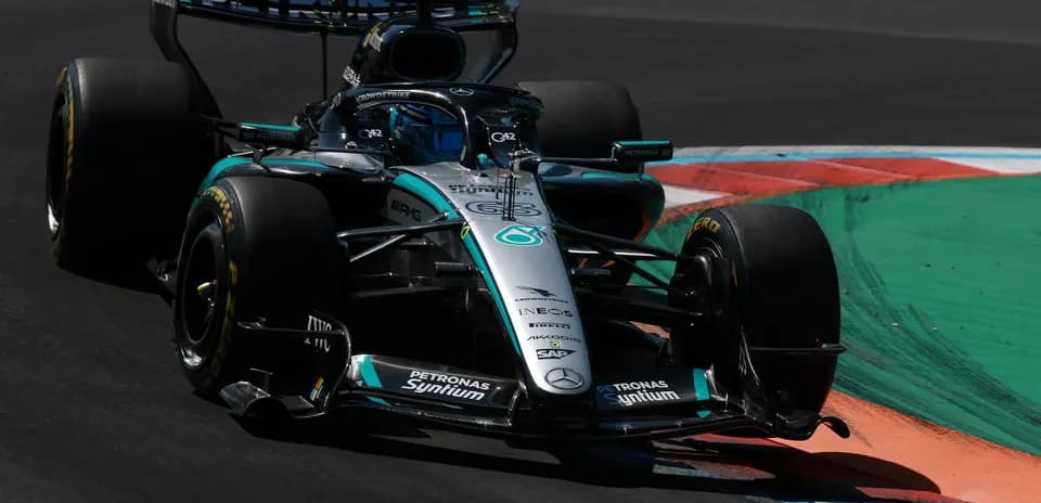 Mercedes Formula 1 car navigating a racing corner