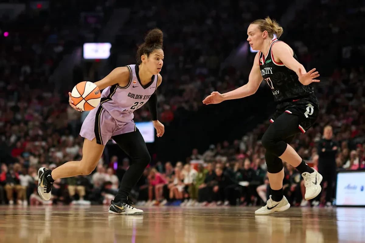 Player from Golden State dribbling past opponent