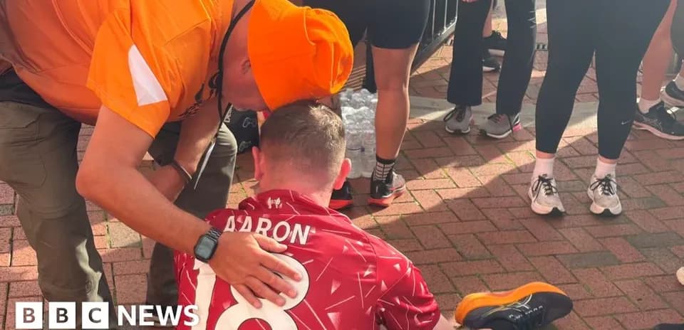 Runner receiving assistance after completing a race