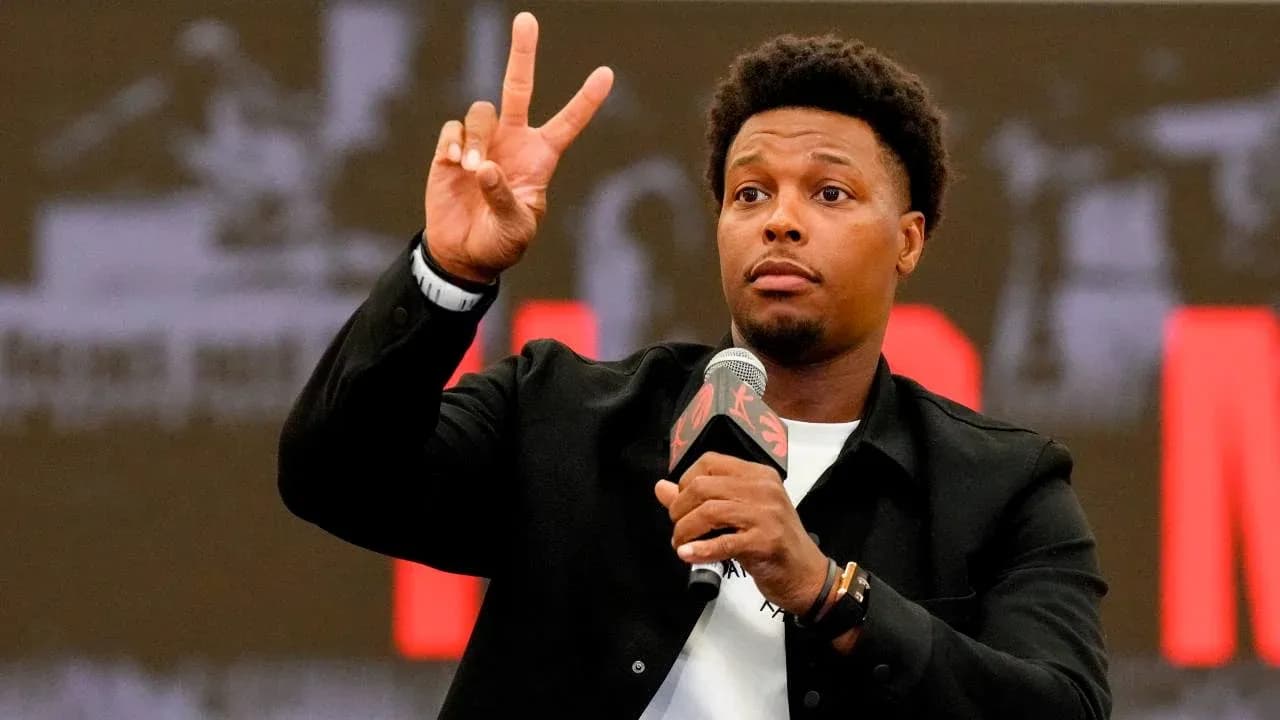 Player gesturing peace sign at press conference