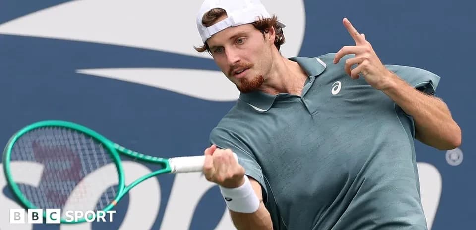 Tennis player preparing to hit a forehand shot