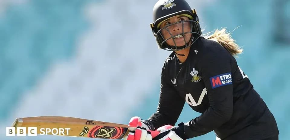 Batter preparing to hit during cricket match