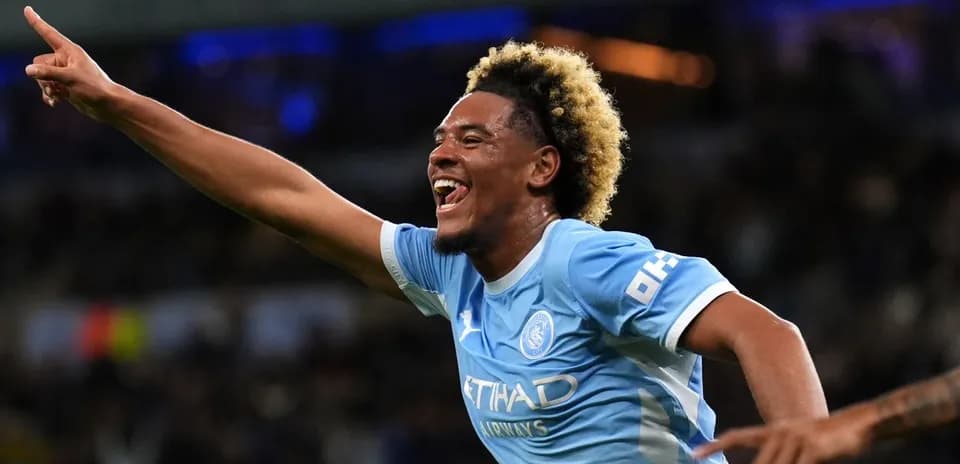 Player celebrating after scoring a goal for Manchester City