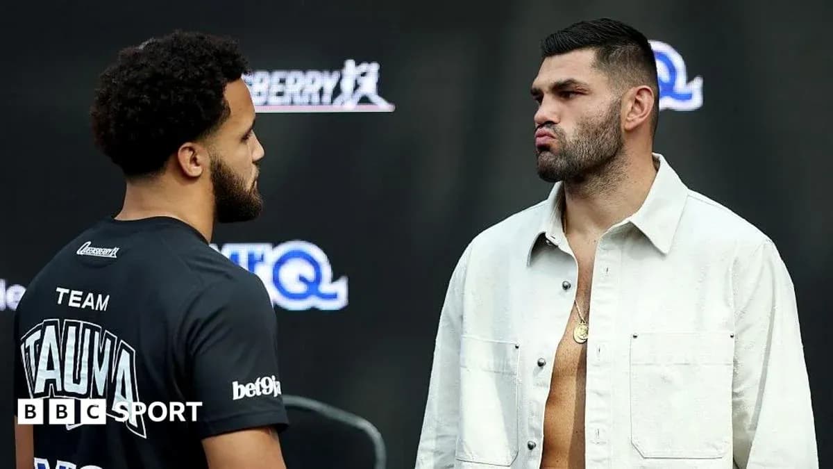 Two boxers facing off at a press event
