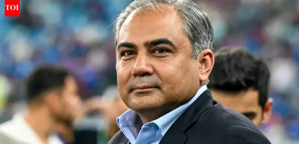 Man in suit looking towards the camera