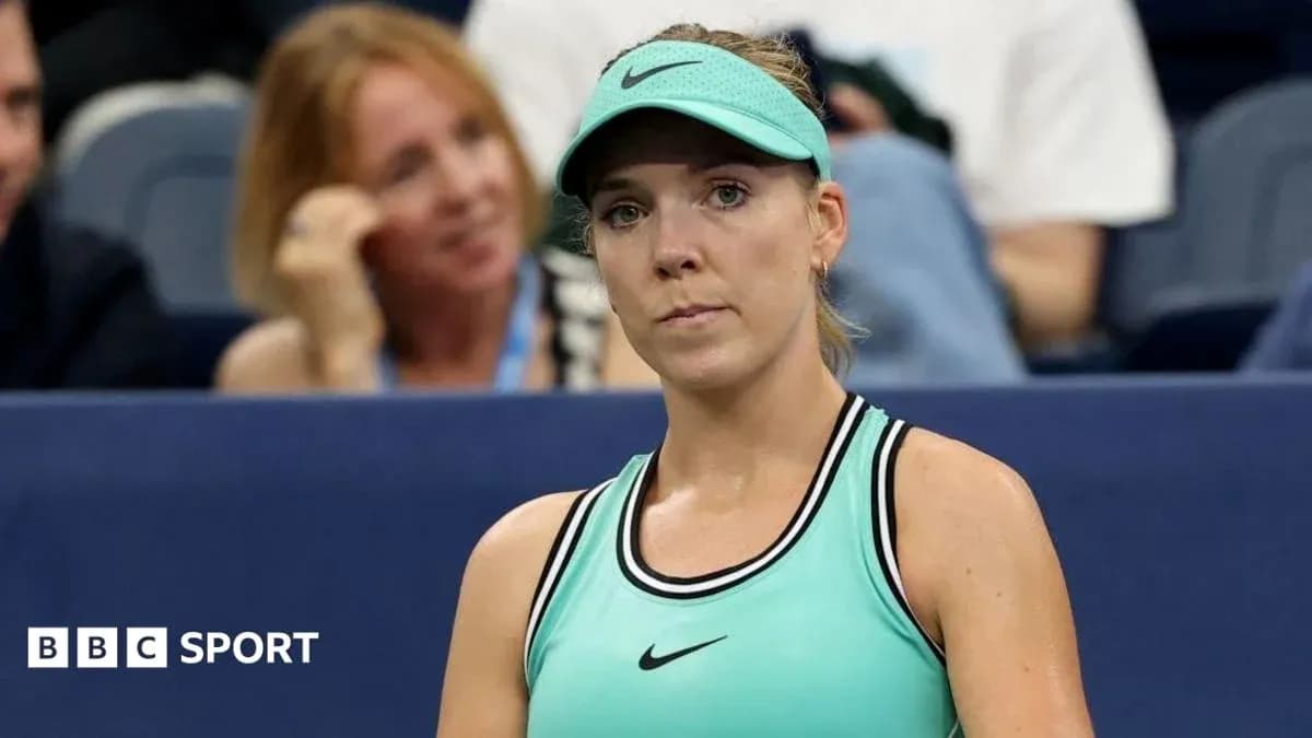 Tennis player in teal outfit during match