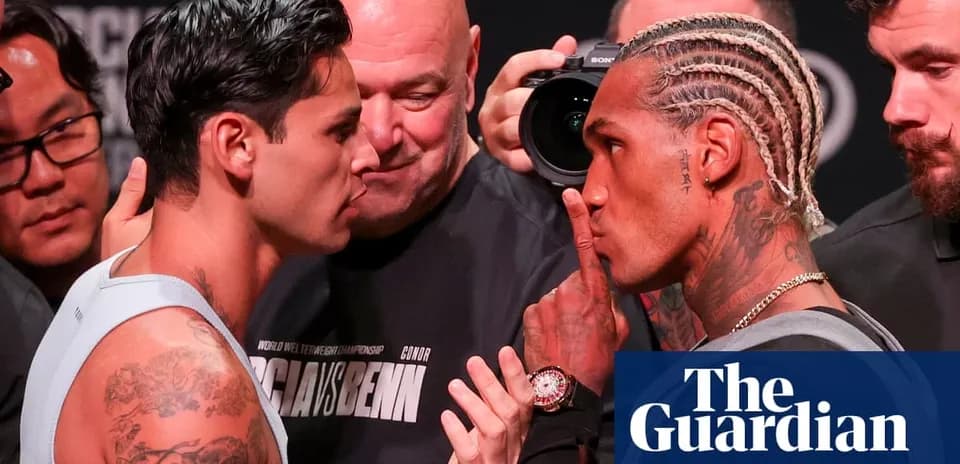 Two boxers facing off during weigh-in event