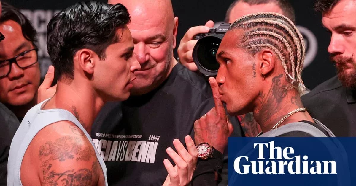 Two boxers facing off during weigh-in event