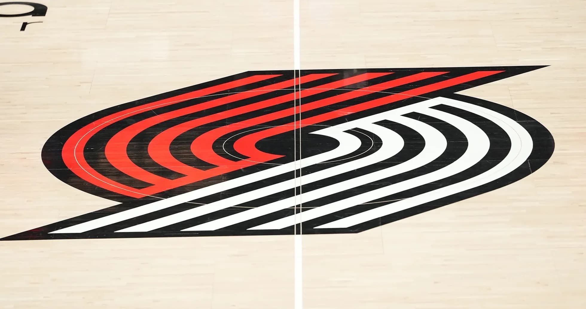 Portland Trail Blazers logo on basketball court