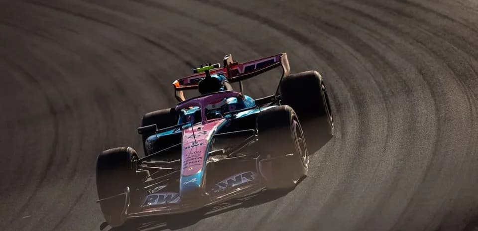 Formula 1 car racing on a curved track