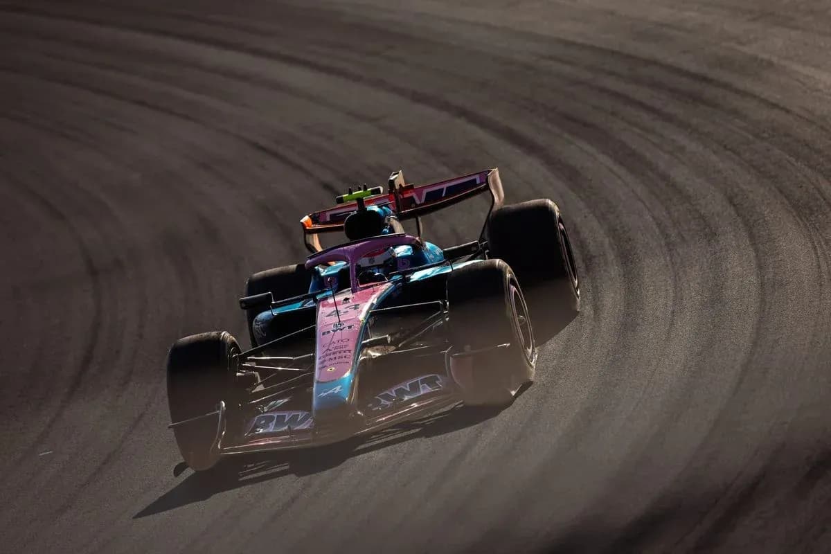 Formula 1 car racing on a curved track