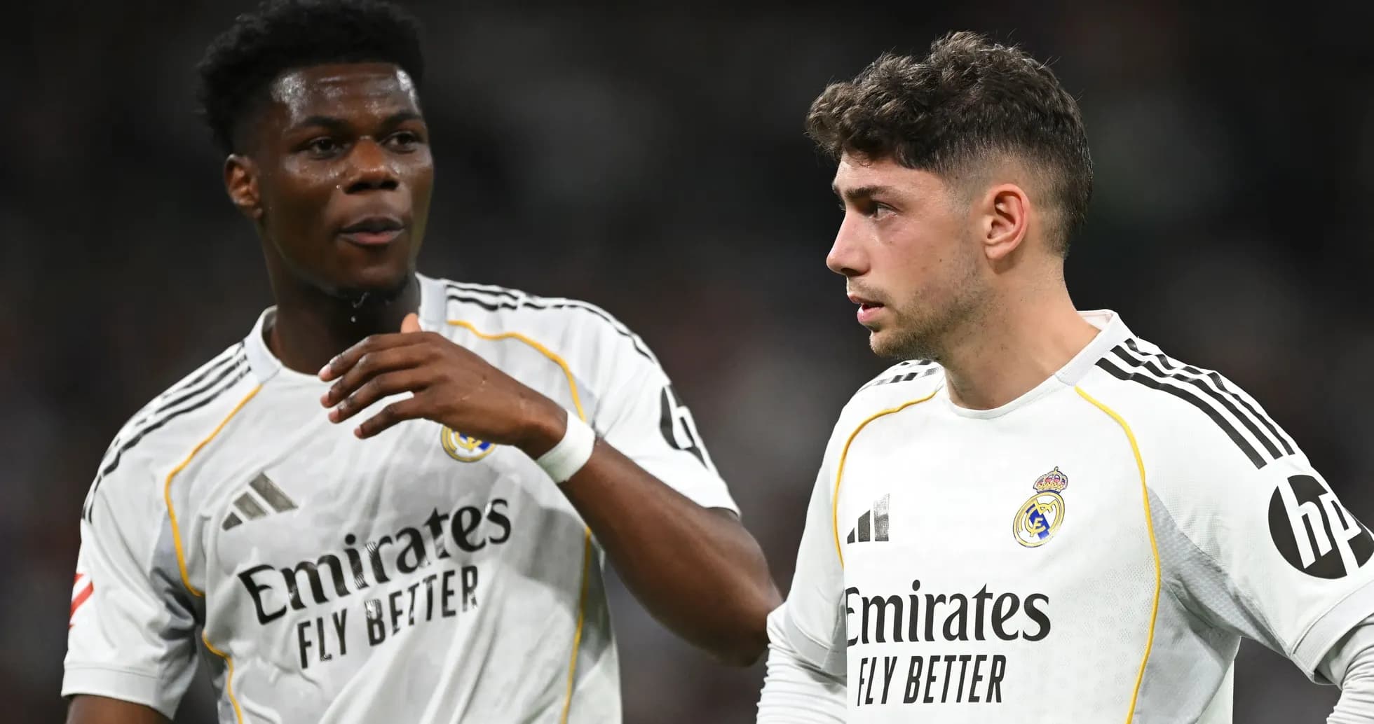 Two Real Madrid players discussing during a match