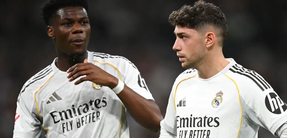 Two Real Madrid players discussing during a match