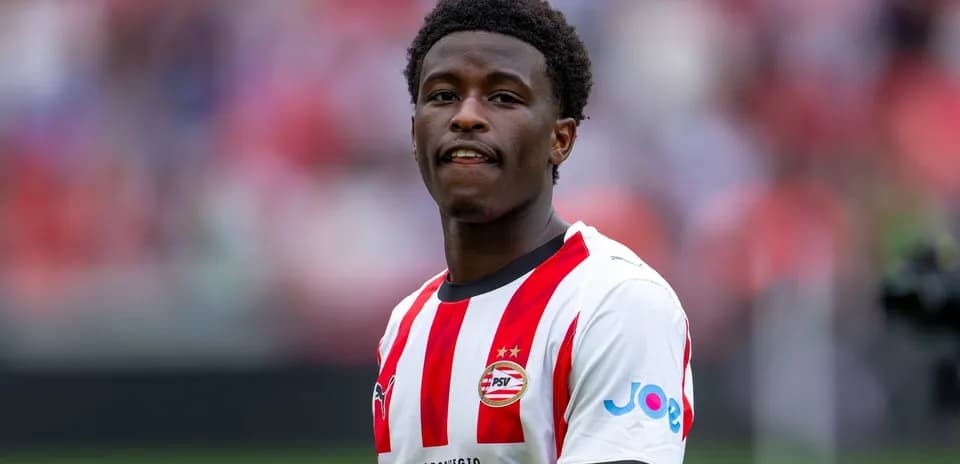 Player in PSV Eindhoven kit during match warm-up