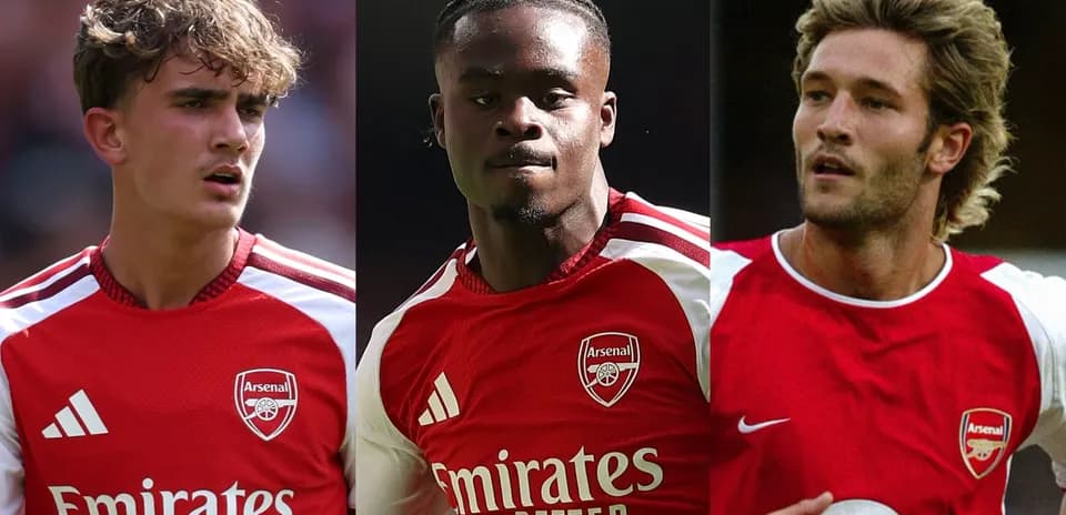 Three Arsenal players in red jerseys
