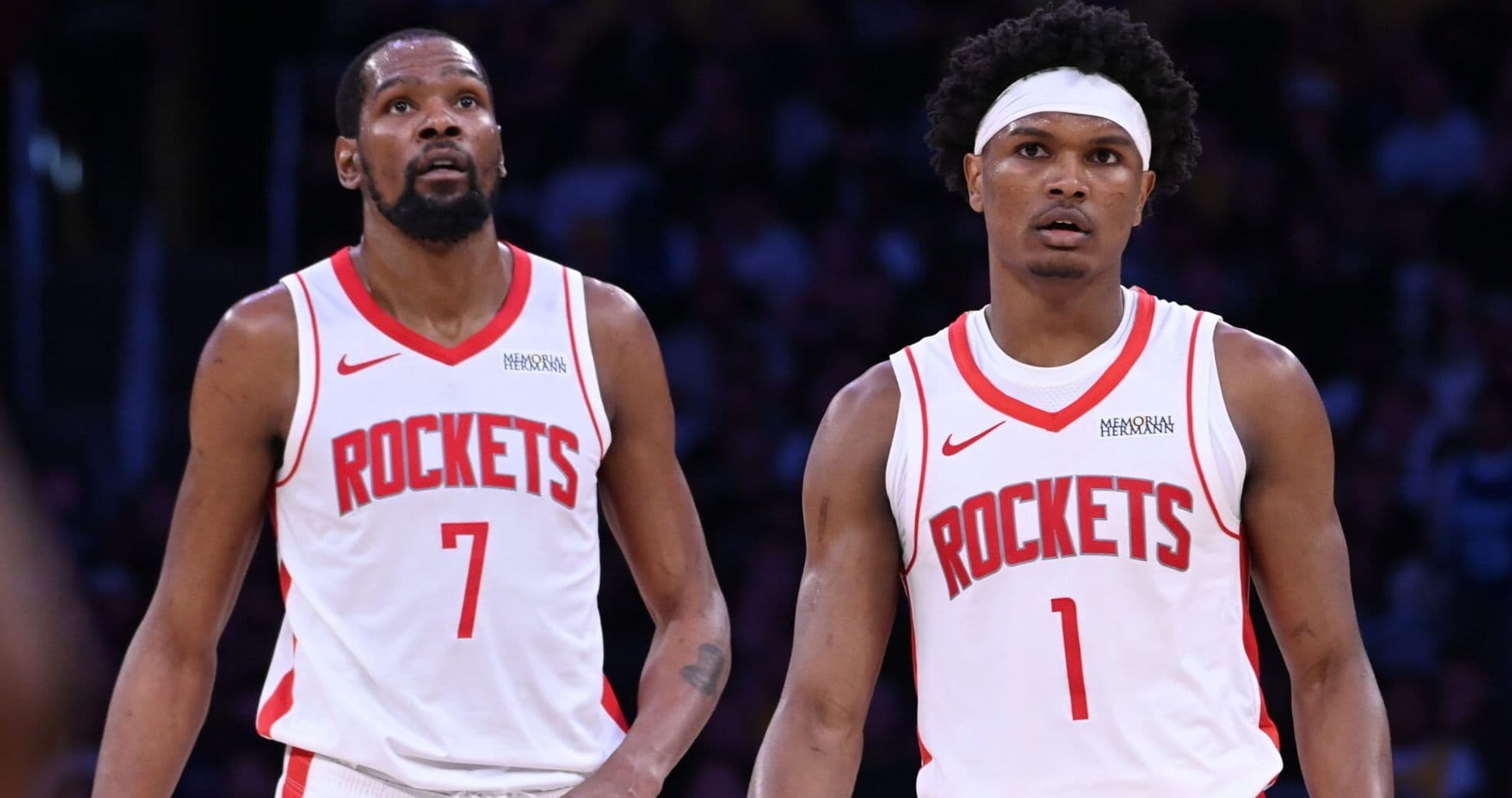Two Houston Rockets players on the court