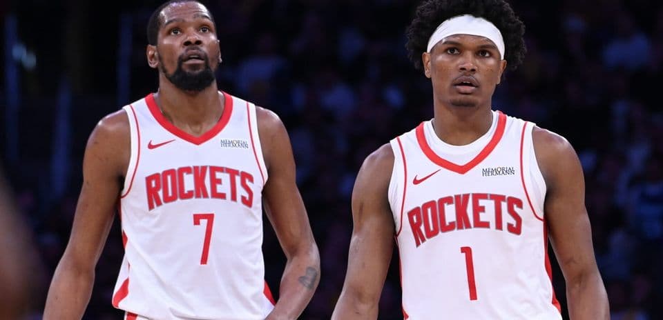 Two Houston Rockets players on the court