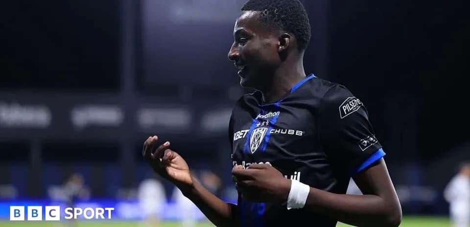 Player celebrating on the pitch after scoring