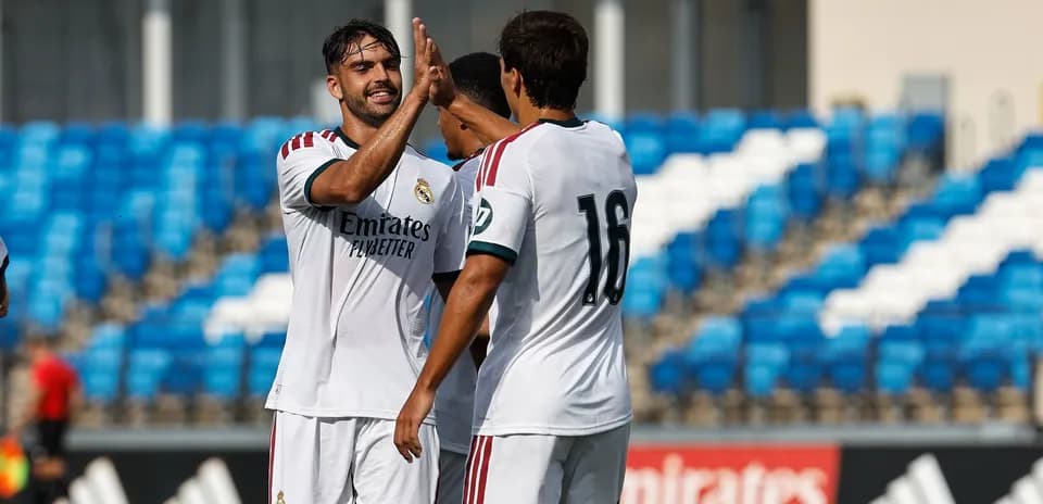 Players celebrating with a high five during match