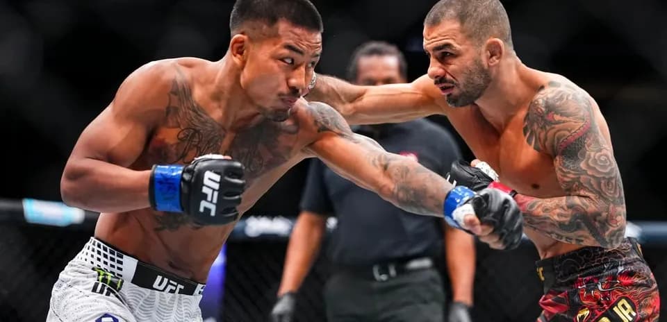 Two fighters exchanging punches in UFC match