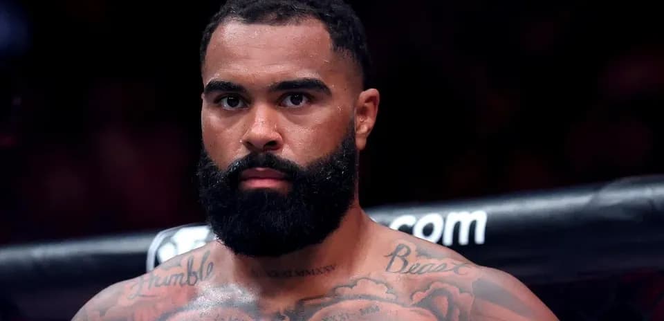 Fighter with tattoos in ring before match