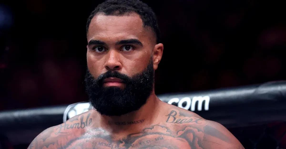 Fighter with tattoos in ring before match