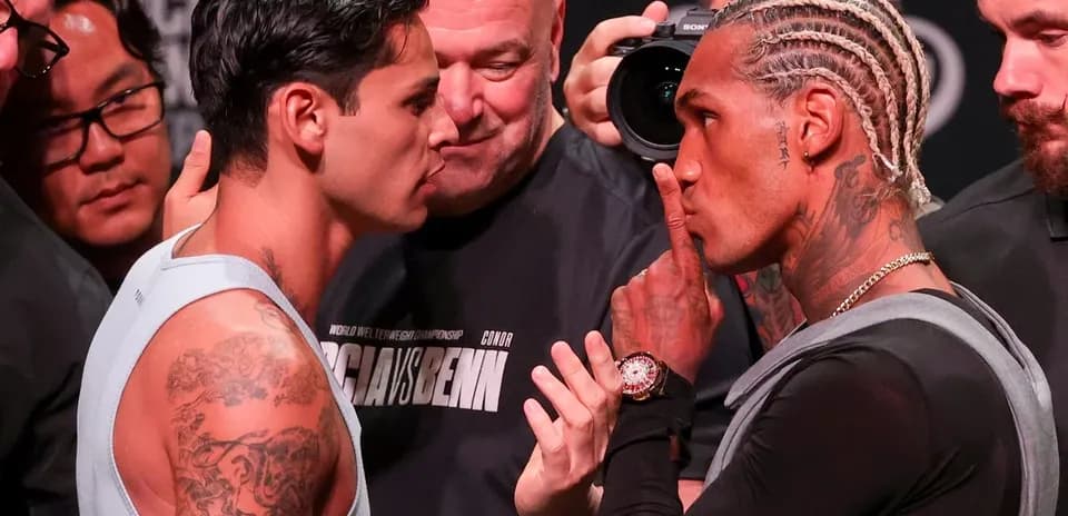 Two fighters face-off at pre-fight weigh-in event
