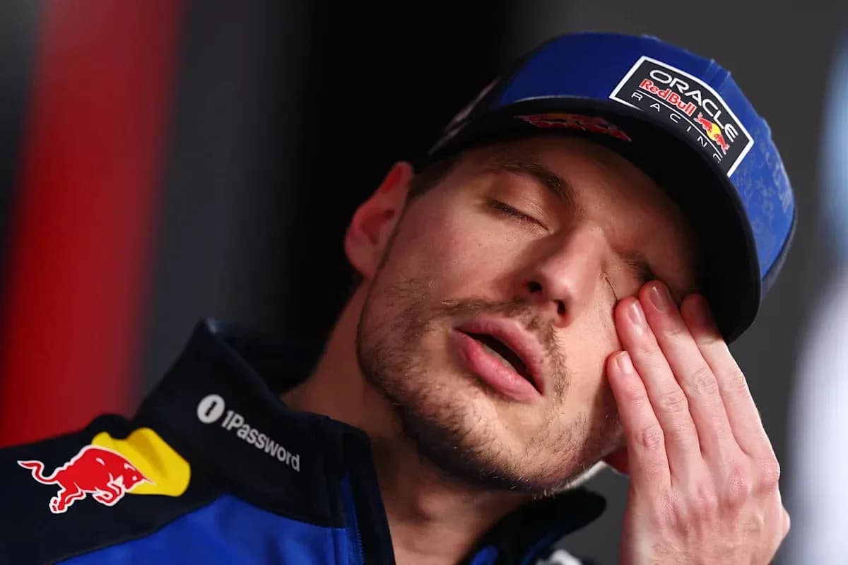 Formula 1 driver resting during press conference