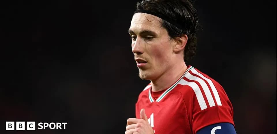 Player wearing captain's armband during match