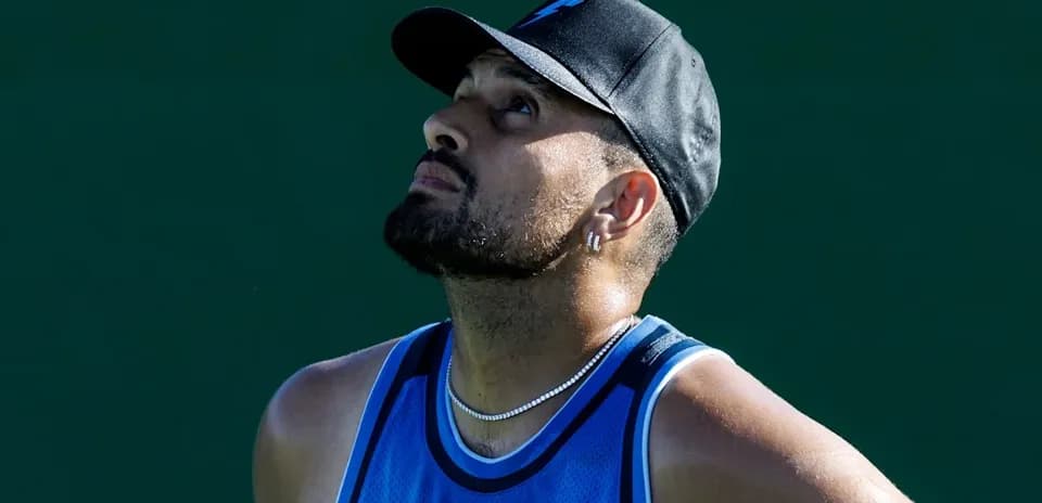 Tennis player looking up during a match