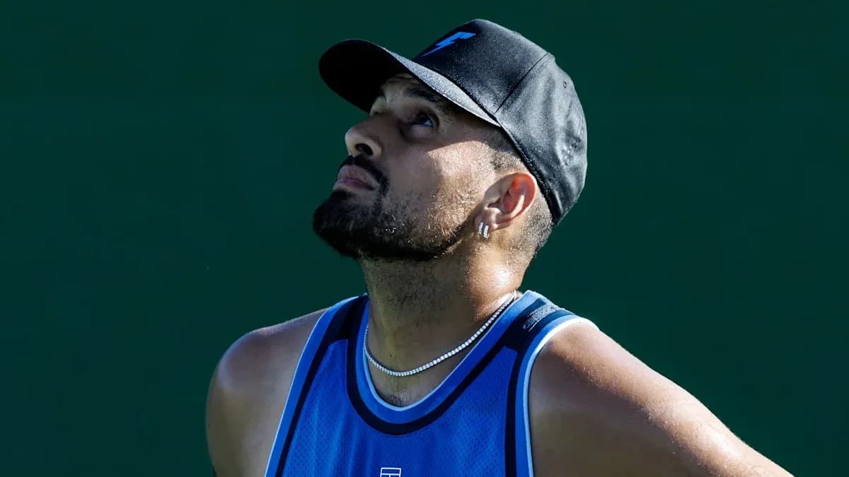 Tennis player looking up during a match