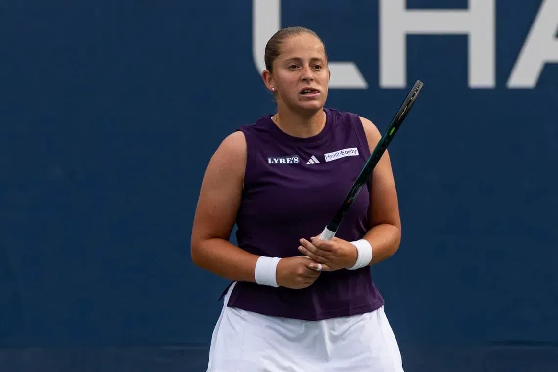 Tennis player holding racket during match