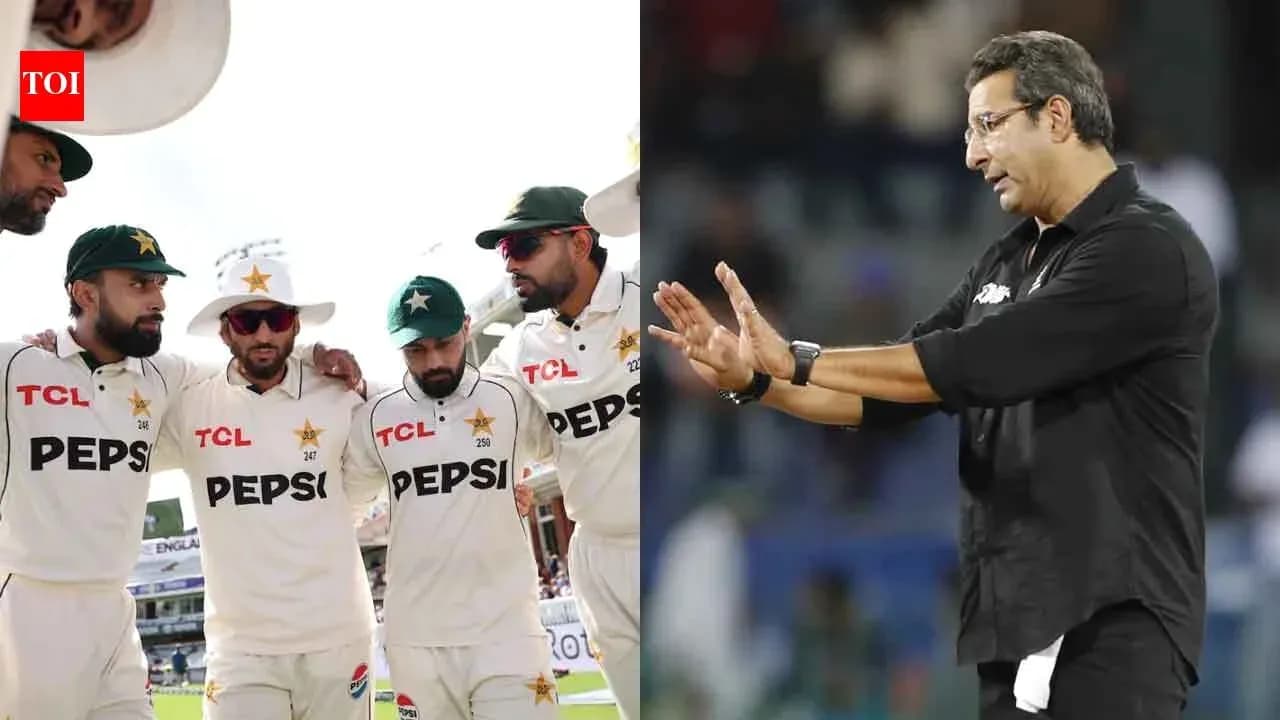 Pakistani cricket team huddling; coach giving instructions