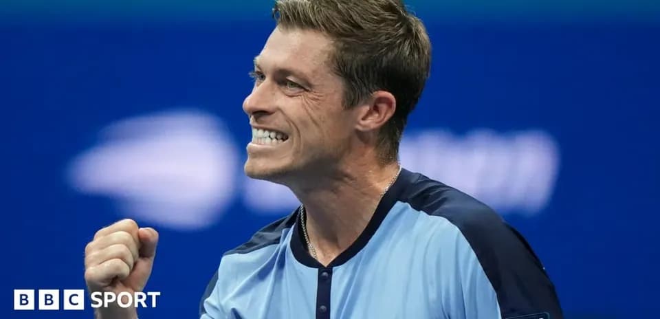 Tennis player celebrating after winning a point