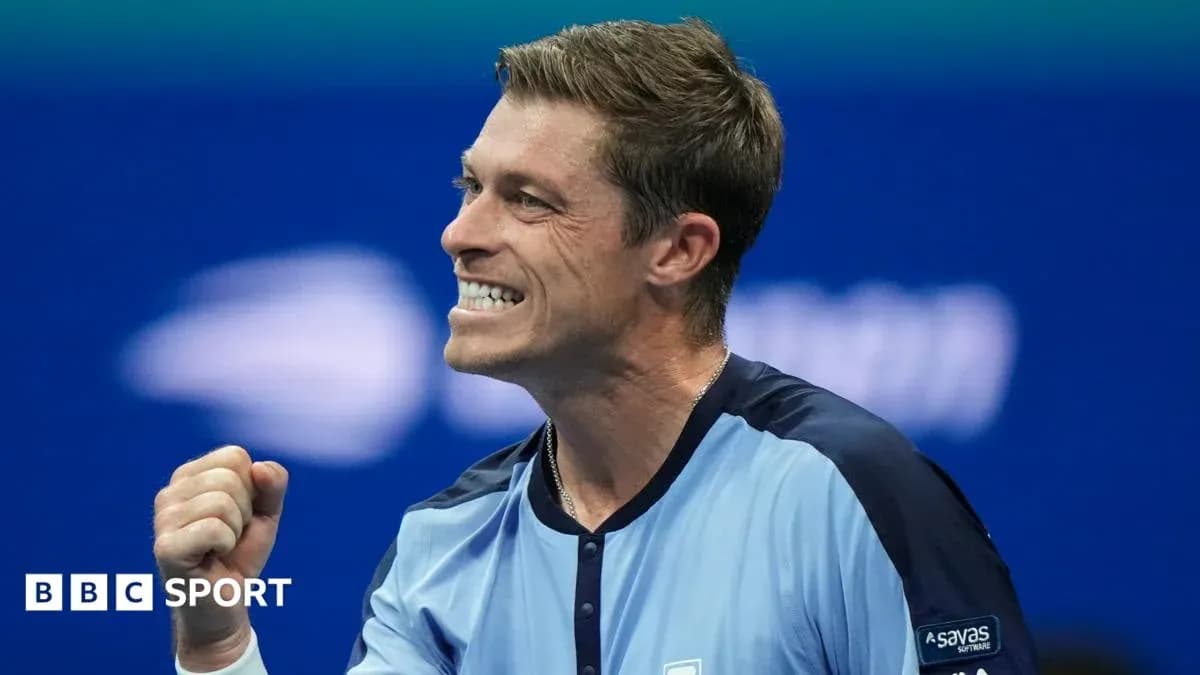 Tennis player celebrating after winning a point