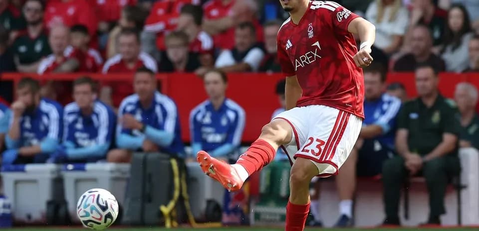 Nottingham Forest player kicking the ball