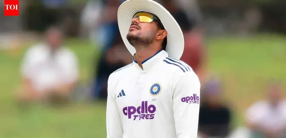 Cricketer looking up during a match in the field