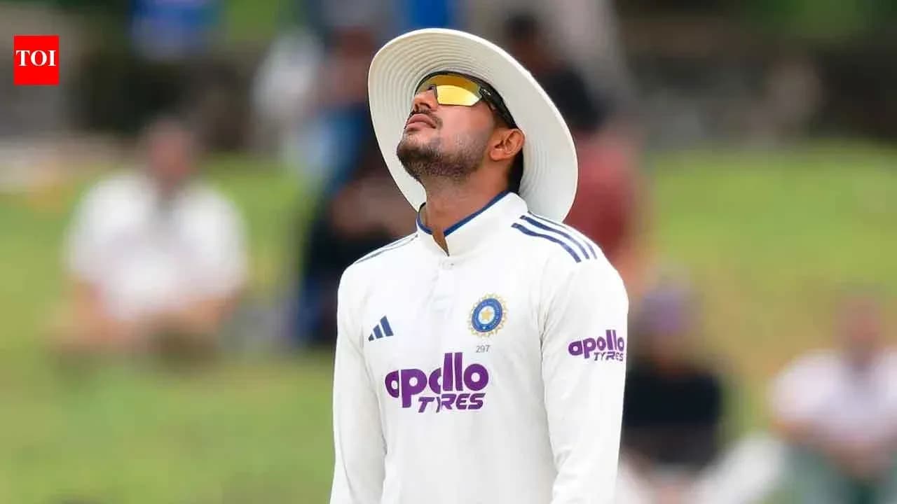 Cricketer looking up during a match in the field