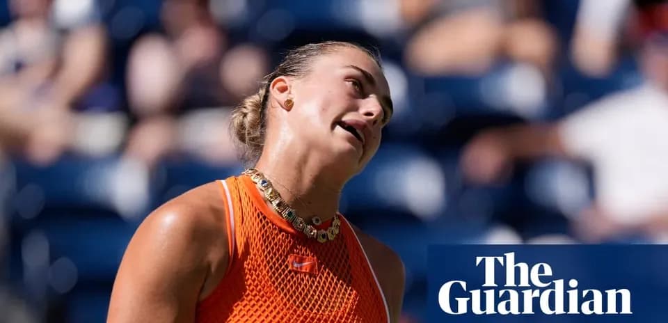 Tennis player reacting during a match on court