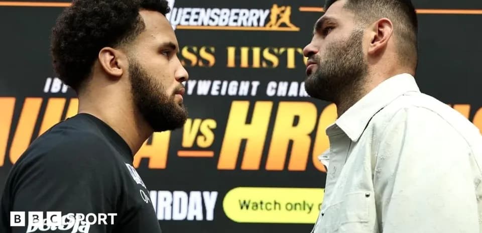 Two boxers facing off at press conference