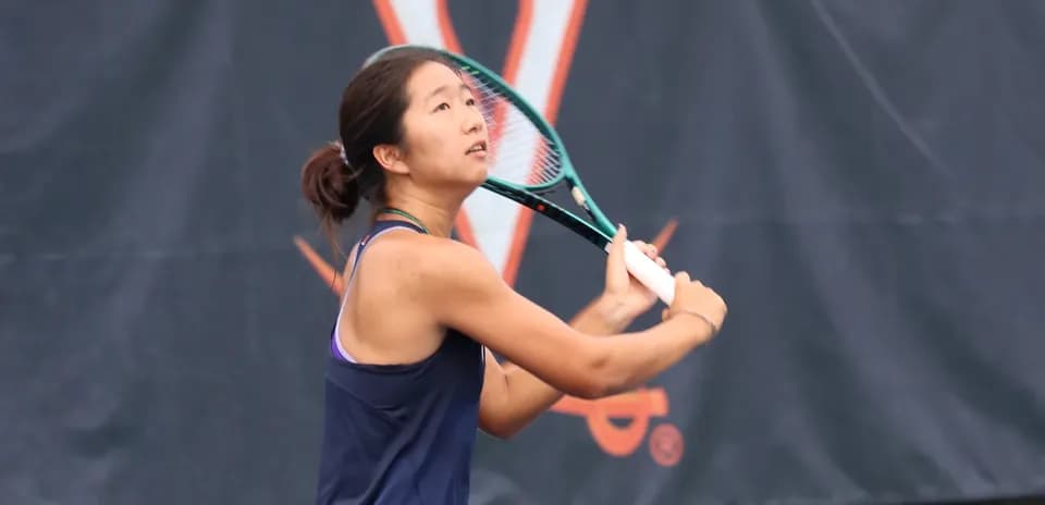 Tennis player preparing to hit a shot on court