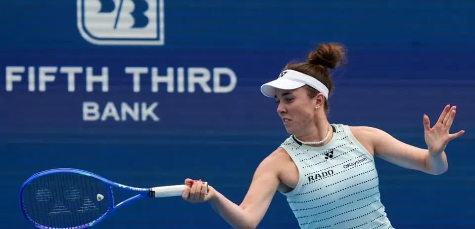 Female tennis player hitting a forehand shot