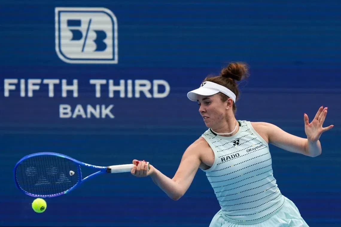 Female tennis player hitting a forehand shot