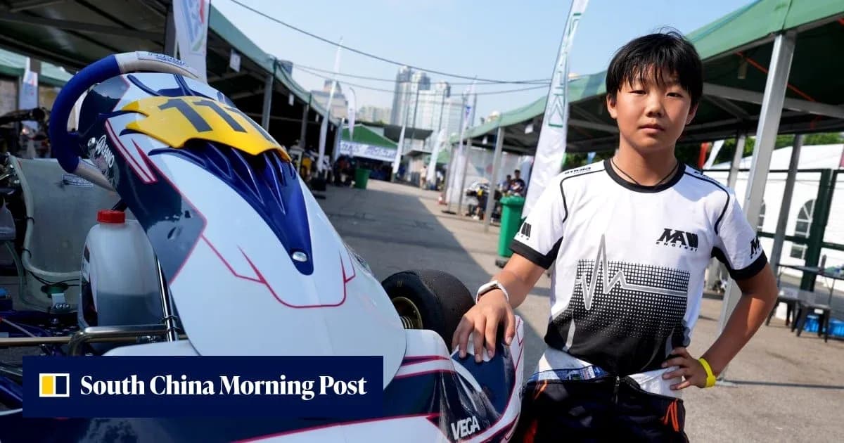 Young kart racer posing beside their kart