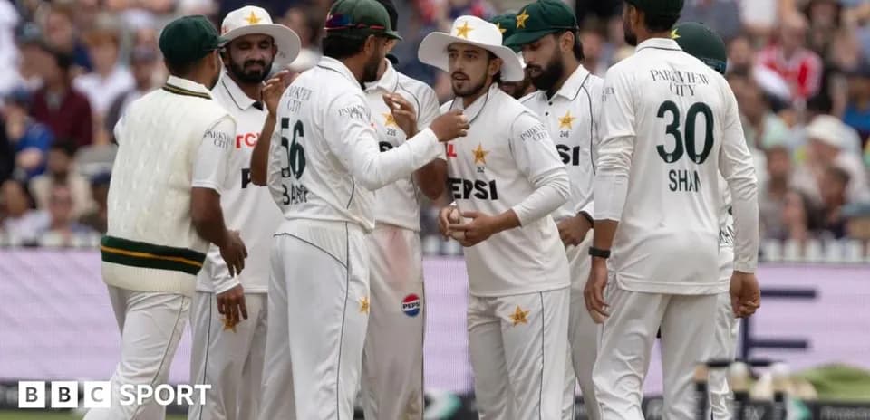 Pakistan cricket team discussing strategy on the field